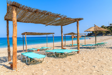 Sunbeds on Potami beach, Samos island, Greece