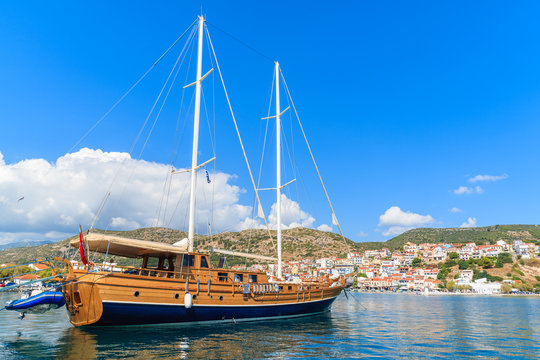 Fototapeta Turkish wooden gulet in Phytagorion port on Samos island, Greece