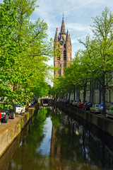 Fototapeta na wymiar Oude Kerk, Old Church of Delft and Canal