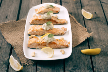 Salmon on the wooden table...