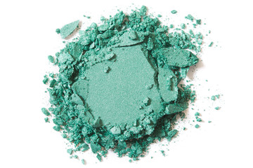 Green eye shadow, cosmetic crushed on white background