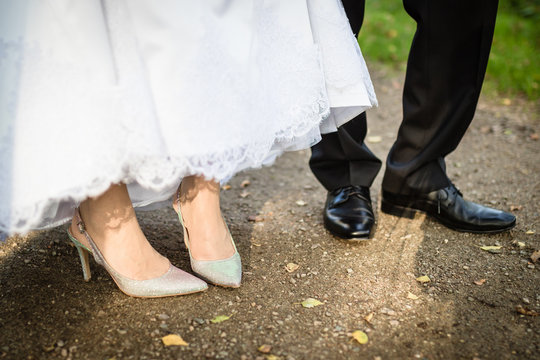 feet of bride and groom, toned image