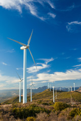Fototapeta premium Wind Turbines generating electricity on a remote hilltop in Spain