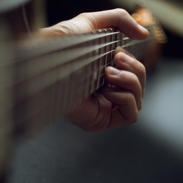 playing electric guitar