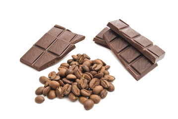 heap of coffee beans and chocolate bar