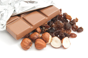 some hazelnuts, raisins and chocolate bar