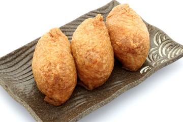 Sushi In Fried Tofu On White Background