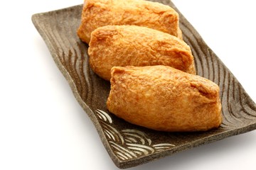 Sushi In Fried Tofu On White Background