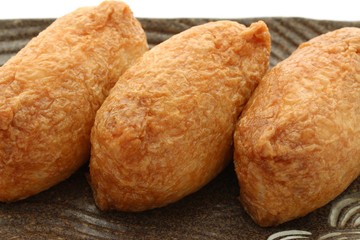 Sushi In Fried Tofu On White Background