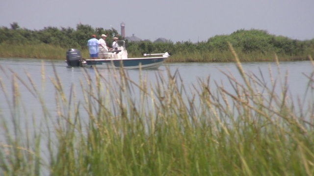 Fishing boat outboard Texas coast left to rt HD