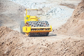 industrial machinery at working construction building site worki