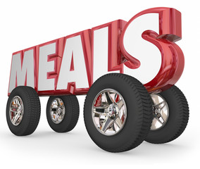 Fototapeta na wymiar Meals Word on 3d Wheels Food Delivery Charity Service