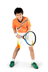 Young boy playing tennis, Isolated over white