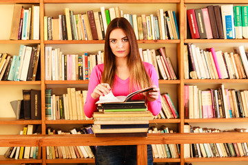 Girl student in college library