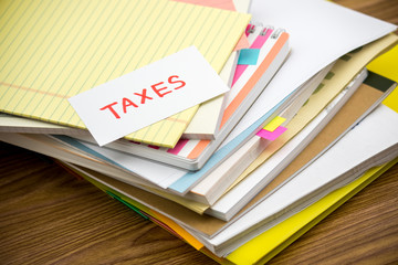 Taxes; The Pile of Business Documents on the Desk