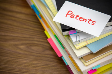 Patents; The Pile of Business Documents on the Desk