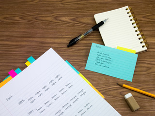 English; Learning New Language Writing Words on the Notebook