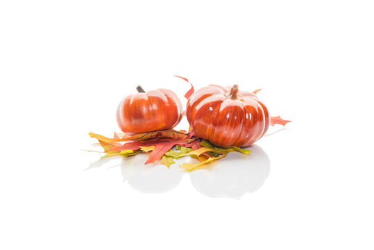 Two Small Pumpkins On White Background