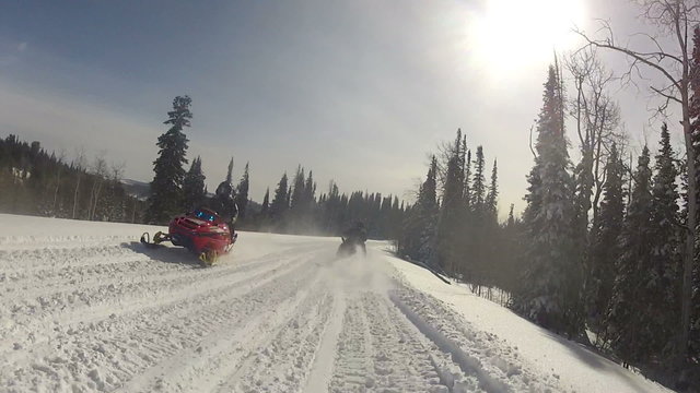 Snowmobile follow ice crystals in air P HD 0053