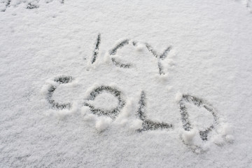 Icy cold text written in snow. Cold drinks concepts.