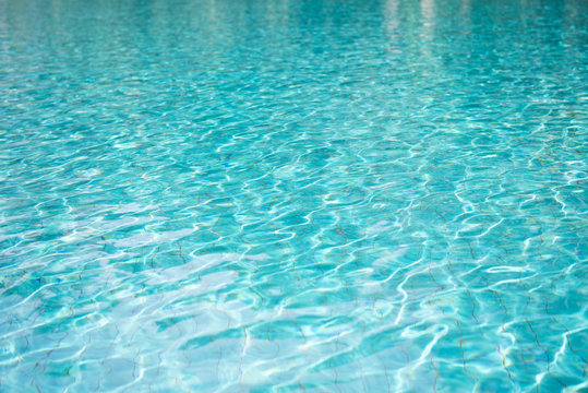 rippled pattern of water in the swimming pool