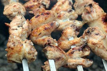 Chicken on the grill to cook