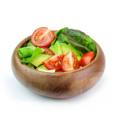 Fresh vegetable salad in wooden bowl Isolated on white background