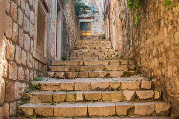  Narrow street and stairs in the Old Town in Dubrovnik, Croatia, Mediterranean ambient
