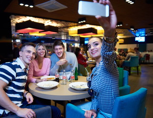 friends have lanch break in shopping mall