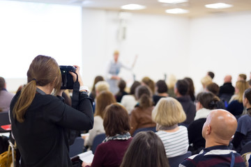 Business Conference and Presentation. Audience at the conference hall. Press conference. 