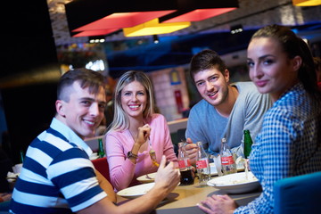 friends have lanch break in shopping mall