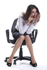  Business woman is sitting and smiling with glasses