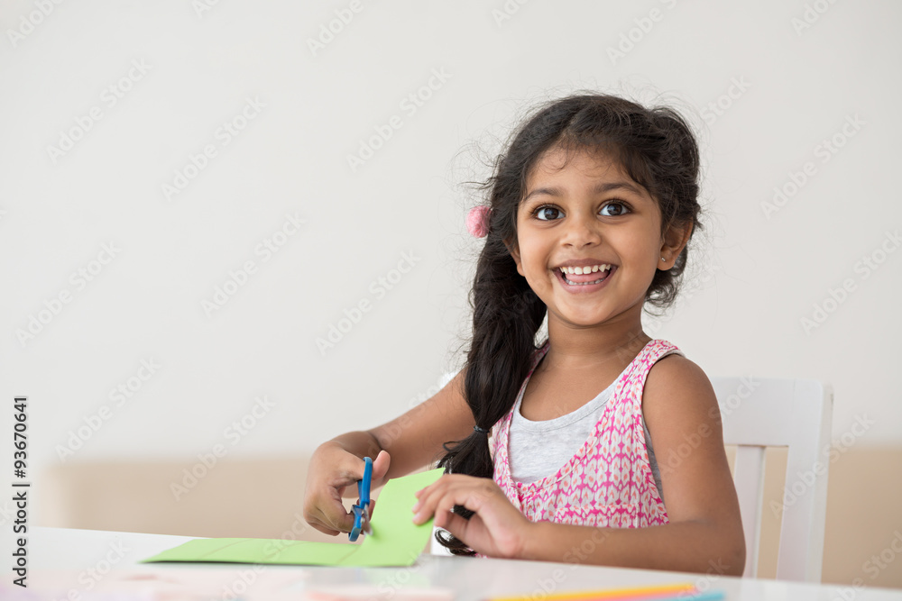 Wall mural Cheerful little girl