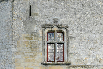 Architecture details close up : medieval ancient style window on a castle