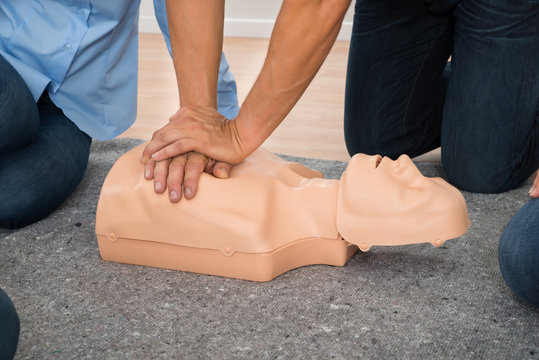 Person Practicing Cpr Chest Compression
