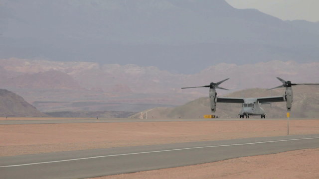 Aircraft V22 Osprey taxi on runway high wind P HD 9431