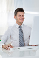 Businessman Working On Computer