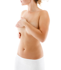 Naklejka premium Woman examining her breast isolated on white background 