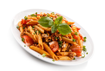 Penne with meat, tomato sauce and vegetables 