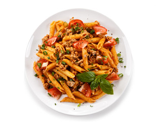 Penne with meat, tomato sauce and vegetables 