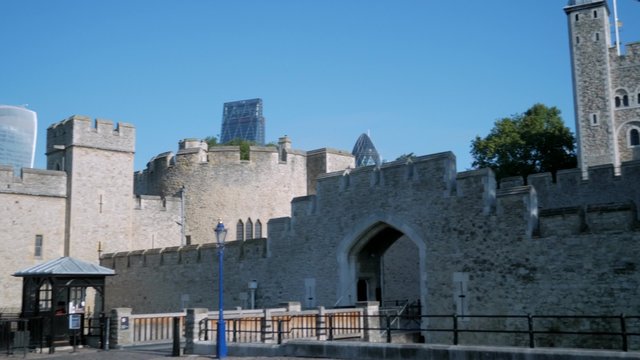 Pan across the river side frontage of the Tower of London. Taken in 4K on a cloudless autumn morning