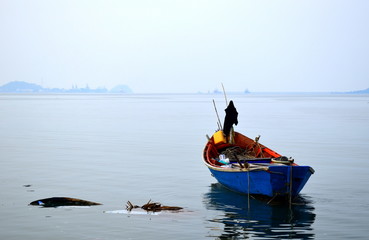 Fisherman boat/fisherman boat on blue sea.