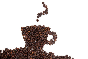 Cup of coffee out of roasted coffee beans. All on white background