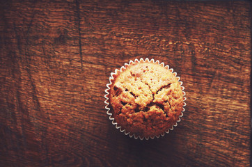 Homemade carrot muffin with empty space on brown wooden backgrou - 93678407