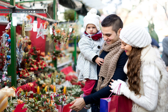 Family Of Four At Christmas Market