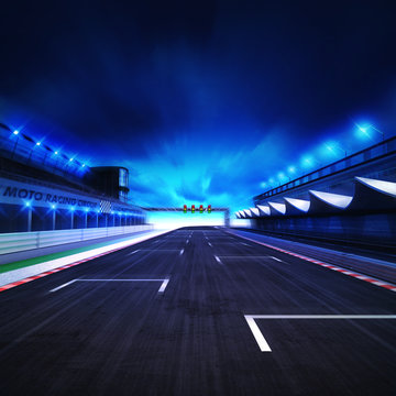 finish drive on the racetrack in motion blur with stadium and spotlights