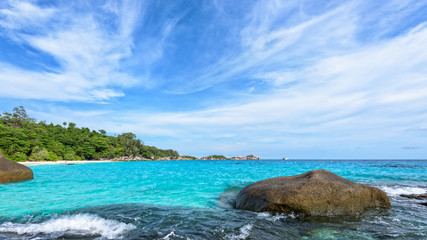 Beautiful landscape blue sky and sea on beach near the rocks during summer at Koh Miang island in Mu Ko Similan National Park, Phang Nga province, Thailand, 16:9 widescreen