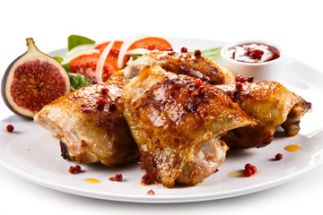 Roasted chicken drumsticks and vegetables