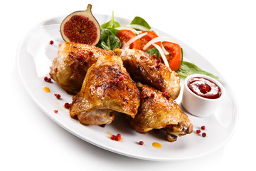 Roasted chicken drumsticks and vegetables