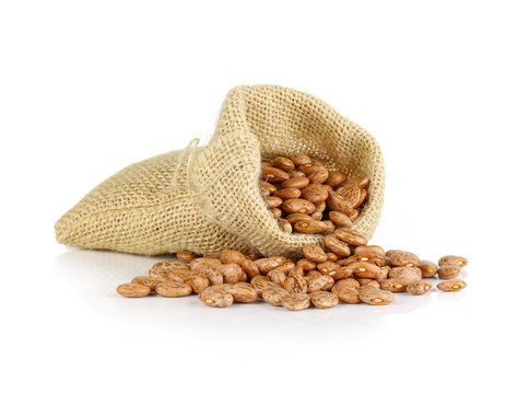 Pinto-beans isolated in sack on white background